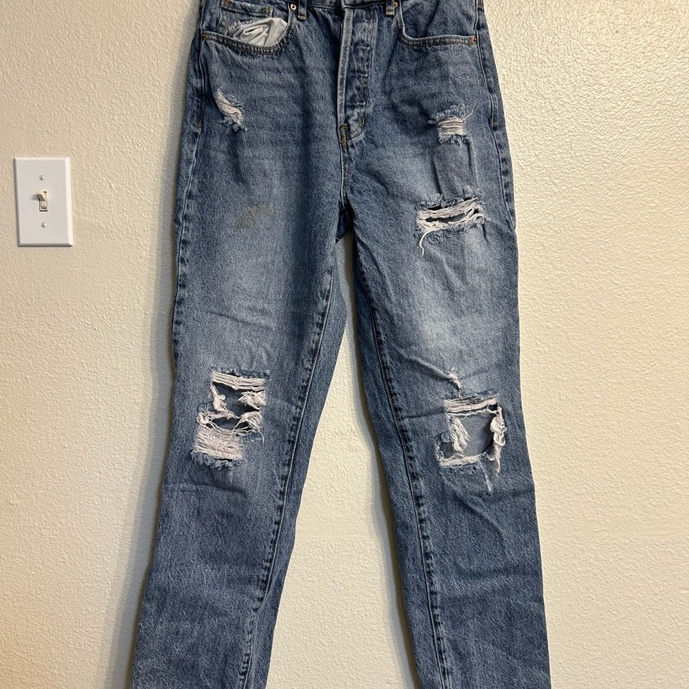 Distressed Blue Denim Jeans